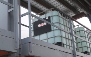 DEF tank at a Taylor Oil Co. yard — diesel exhaust fluid storage for on-site fleet fueling
