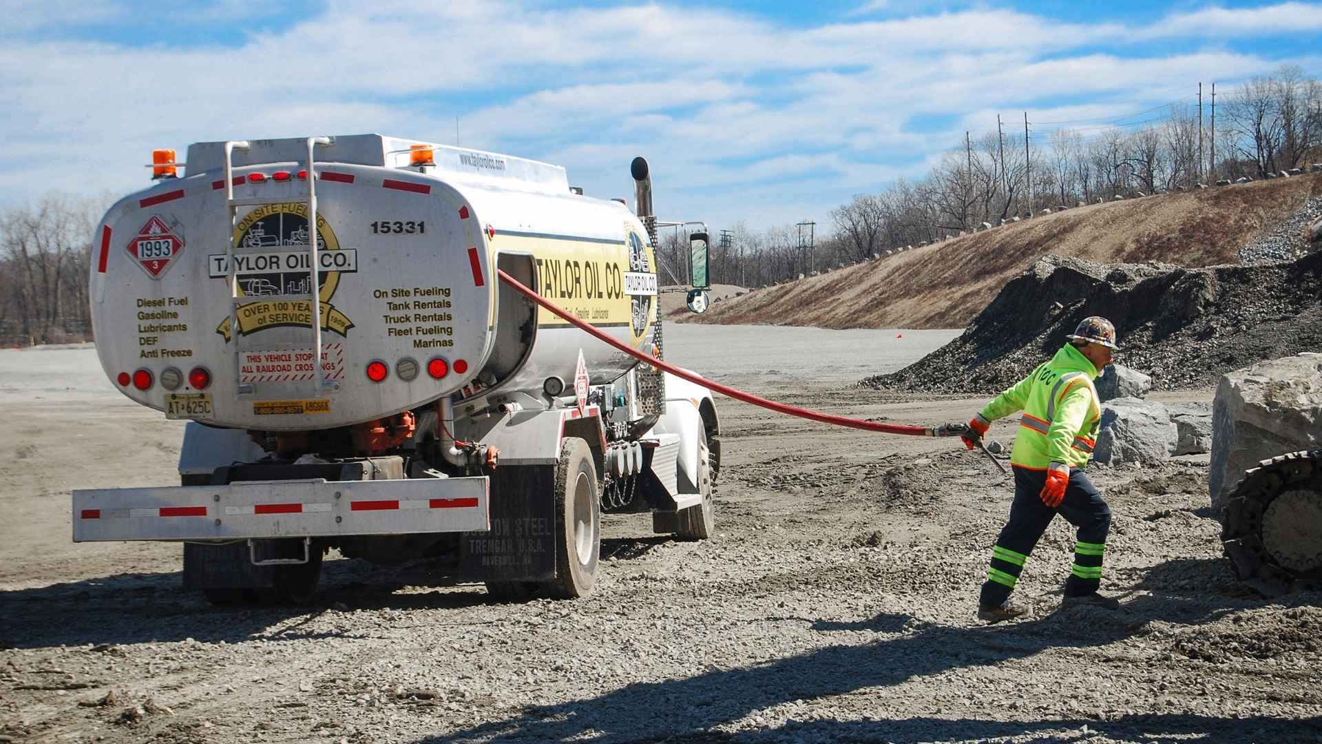 Taylor Oil truck providing mobile wet hose fueling for construction equipment in Richmond VA.